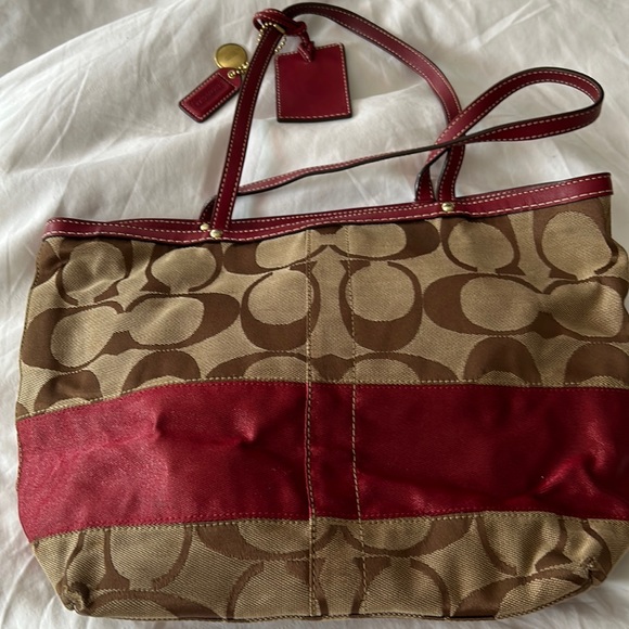 Authentic wine and brown monogram Coach shoulder bag. - Picture 1 of 10